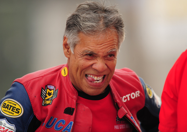 Pro Stock Motorcycle rider Hector Arana makes a funny face during the second qualifying session for the NHRA Mello Yello Series Toyota Nationals at The Strip at Las Vegas Motor Speedway in Las Veg ...