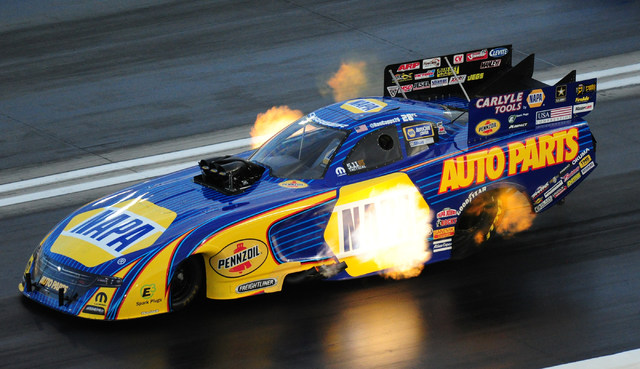 Funny Car driver Ron Capps lays down a pass of 326.71 MPH at 3.881 elapsed time during the second qualifying session for the NHRA Mello Yello Series Toyota Nationals at The Strip at Las Vegas Moto ...