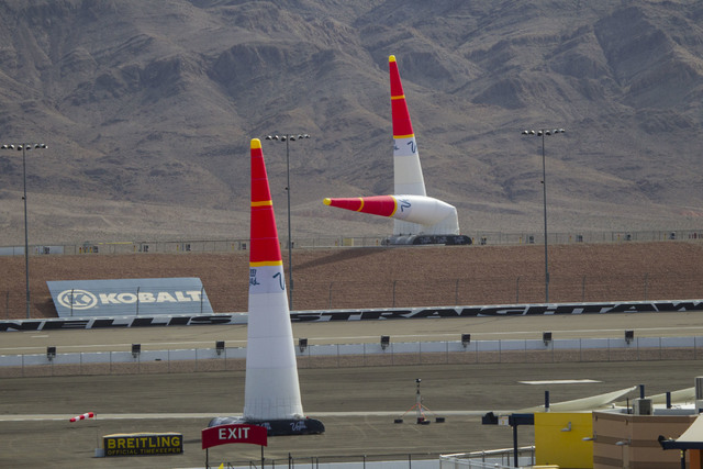 An air race pylon marker is blown over in strong winds on the final day of the Red Bull Air Race World Championship at the Las Vegas Motor Speedway, Sunday, Oct. 16, 2016. (Richard Brian/Las Vegas ...