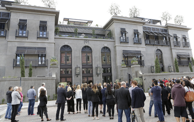 Invitees gather to attend the opening ceremony of Restoration Hardware's first Nevada location at Tivoli Village Friday, Oct. 28, 2016, in Las Vegas. Restoration Hardware's store is called RH Las  ...