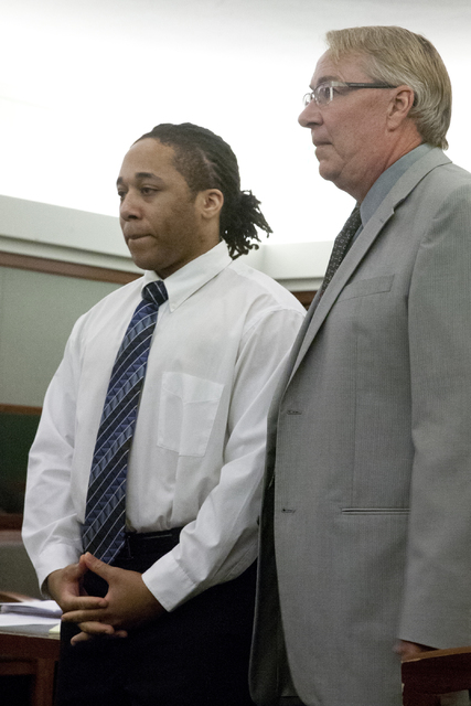 Michael Solid (left), on trial in the killing of 15-year-old Marcos Arenas, a Las Vegas high schooler, stands with with Assistant Special Public Defender Randy H. Pike as they await the arrival of ...