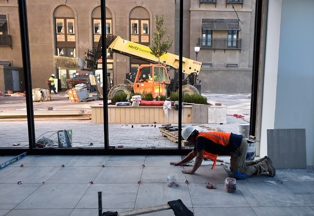 Work continues on the second phase of Tivoli Village, Friday, Oct. 21, 2016, in Las Vegas. An additional 350,000 square-foot of retail and office space is schedule to open at the end of the month. ...