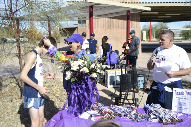 Ken Kerby, vice president of the Henderson Police Officers’ Association, and Julie Proctor, executive director of S.A.F.E. House, host the annual Run for Shelter 5K and 1 Mile Run, Walk or Strol ...