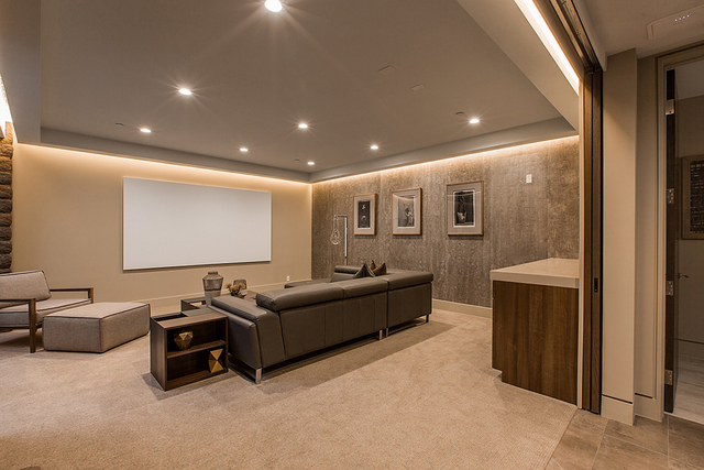 The home theater has a modern design. (Courtesy)