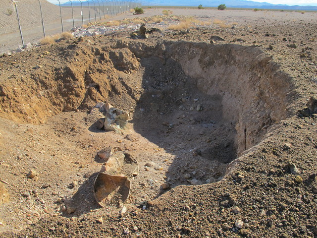 A 20-foot-diameter subsidence crater was left after Nevada's low-level radioactive waste landfill erupted Oct. 18, 2015. (Maj. Nate Taylor/Nevada Army National Guard)