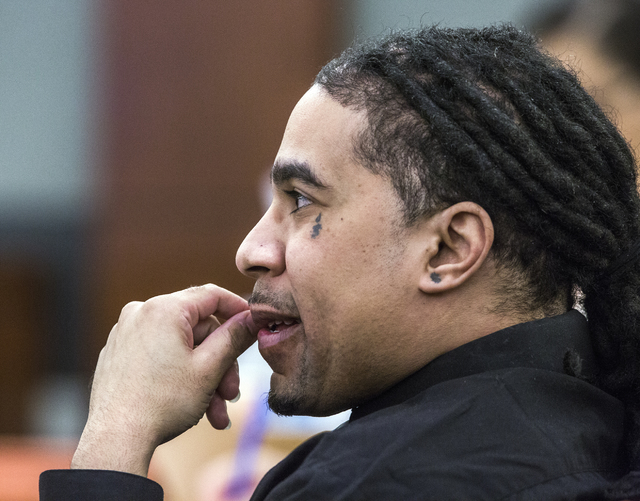 Defendant Eric Covington listens during his death penalty trial at Regional Justice Center on Friday, Oct.14, 2016. Covington is accused of fatally stabbing his ex-girlfriend, Sagittarius Gomez, w ...