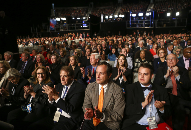 Attendees clap before the third presidential debate begins at the Thomas & Mack Center at UNLV in Las Vegas on Wednesday, Oct. 19, 2016. Chase Stevens/Las Vegas Review-Journal Follow @cssteven ...