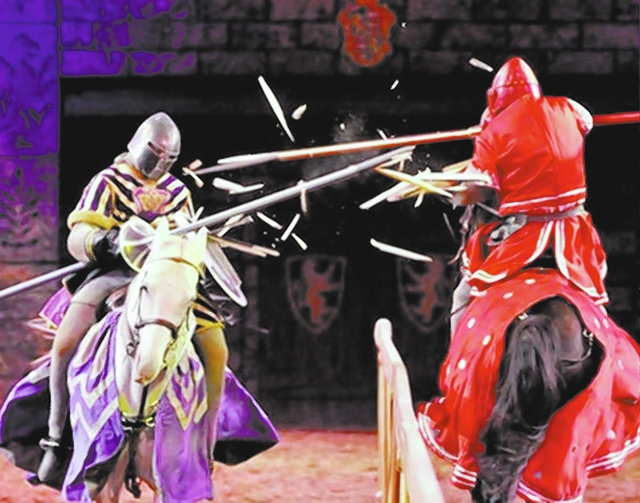 BILL HUGHES/LAS VEGAS REVIEW-JOURNAL
Anthony Root, on Osiris, left, and Chris Warren, on Cubby, demonstrate their jousting skills after the "Tournament of Kings" at the Excalibur.
