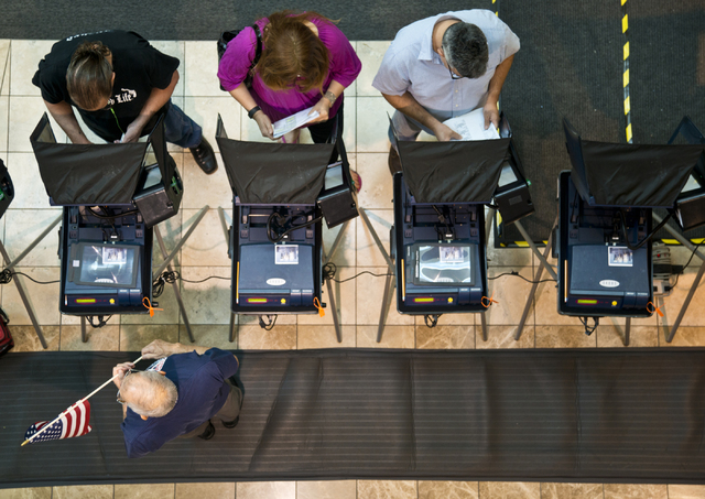 Voters cast ballots during the first day of early voting at the Galleria at Sunset in Henderson on Saturday morning, Oct. 22, 2016. Daniel Clark/Las Vegas Review-Journal Follow @DanJClarkPhoto