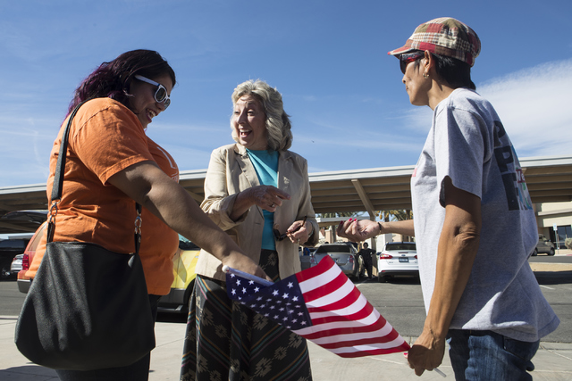 Astrid Silva, left, and her mother, Barbara Silva speak with Congresswoman Dina Titus, D-Nev., during an early voting event at the East Las Vegas Community Center in Las Vegas on Saturday, Oct. 22 ...