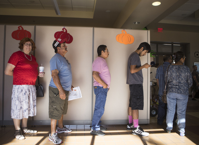 People wait in line during early voting at the East Las Vegas Community Center in Las Vegas on Saturday, Oct. 22, 2016. Loren Townsley/Las Vegas Review-Journal Follow @lorentownsley