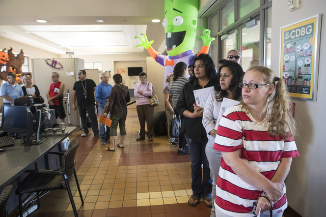 Tifnie Bobbitt, right, and others wait in line during early voting at the East Las Vegas Community Center in Las Vegas on Saturday, Oct. 22, 2016. Loren Townsley/Las Vegas Review-Journal Follow @l ...