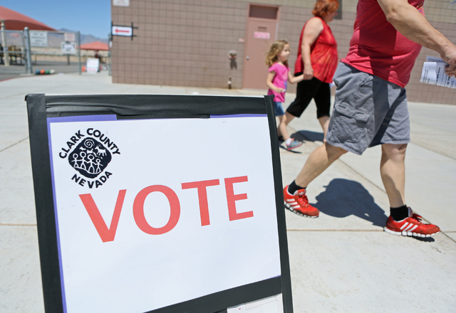 People leave after voting in the primary election at Robert L. Forbuss Elementary School, Tuesday, June 14, 2016, in Las Vegas. (Ronda Churchill/Las Vegas Review-Journal)