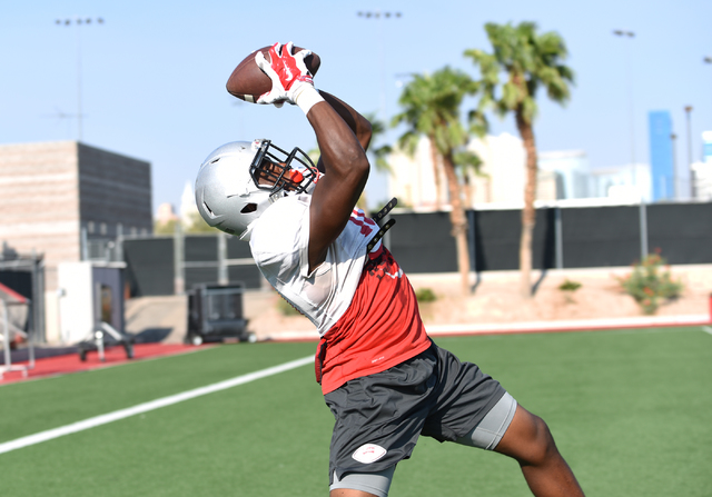 Wide Receiver Darren Woods Jr. (10) catches a pass during football practice at Rebel Park inside the UNLV campus in Las Vegas on Thursday, Aug. 25, 2016. (Martin S. Fuentes/Las Vegas Review-Journal)