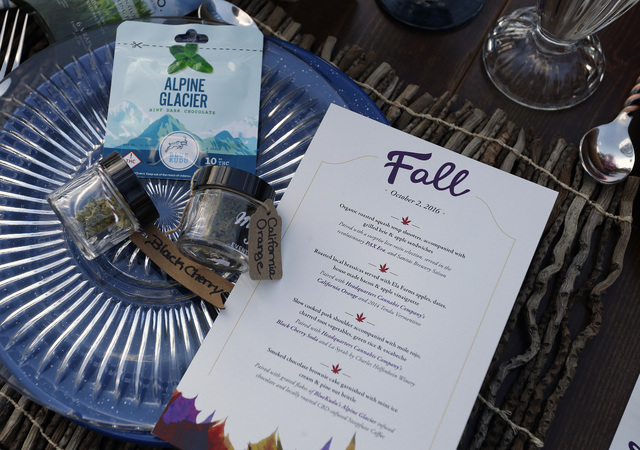 A menu shows the dishes paired with certain strains of pot during an evening of pairings of fine food and craft marijuana strains served to invited guests dining at Planet Bluegrass, an outdoor ve ...