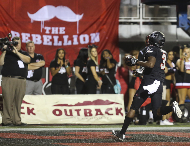 UNLV running back Lexington Thomas (3) scores a touchdown during a football game at Sam Boyd Stadium in Las Vegas on Saturday, Oct. 1, 2016. Miranda Alam/Las Vegas Review-Journal Follow @miranda_alam