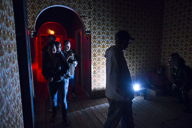 Visitors walk through an attraction during "Bonnie Screams" at Bonnie Springs Ranch outside of Las Vegas on Tuesday, Oct. 25, 2016. (Chase Stevens/Las Vegas Review-Journal Follow @csstevensphoto)