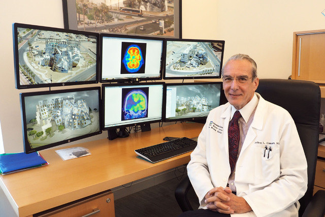 Dr. Jeffrey Cummings, medical director for the Lou Ruvo Center for Brain Health, poses in front of a multi-computer display during an interview in his office at the Ruvo Center in Las Vegas, Monda ...