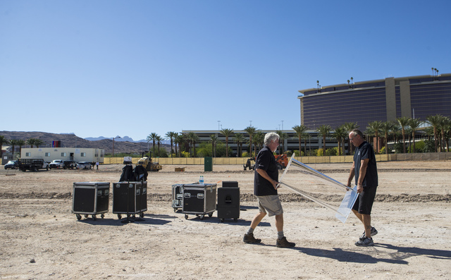The podium is moved after the groundbreaking ceremony for the Las Vegas NHL expansion team's practice facility and headquarters in Las Vegas on Wednesday, Oct. 5, 2016. (Chase Stevens/Las Vegas Re ...