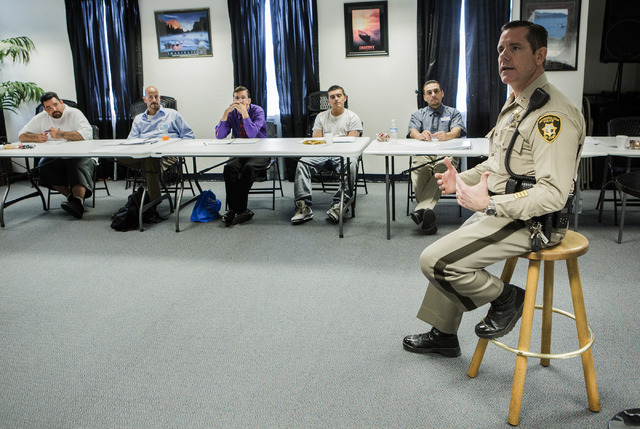 Las Vegas police correctional officer Capt. Bill Teel addresses former inmates during a pre-vocational leadership workshop at Hope for Prisoners, 3430 E. Flamingo Road, on Thursday Aug. 18, 2016. ...