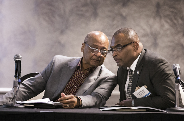 Bob Woodson, left, founder of the Center for Neighborhood Enterprise in Washington, D.C., and the Rev. Jon Ponder, founder and CEO of Hope for Prisoners, talk during the Repairing the Breach summi ...