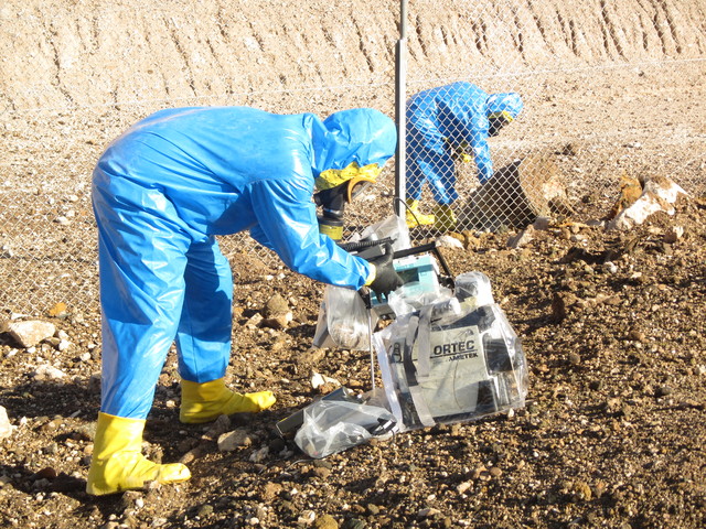 An entry team surveys the eruption site at the state's low-level radioactive waste landfill 11 miles south of Beatty on Oct. 19, 2015. (Maj. Nate Taylor/Nevada Army National Guard)