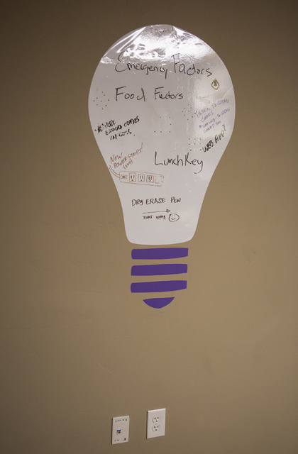 A lightbulb shaped message board hangs on the wall in the employee break room at LaunchKey, a Las Vegas-based technology company that was recently acquired by Portland, Oregon-based iovation, on F ...