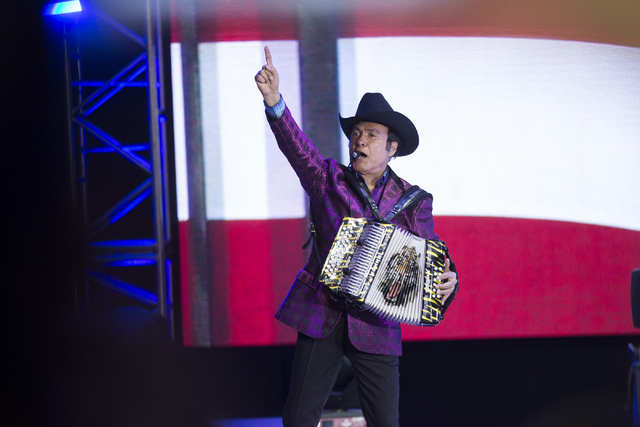 Mexican music group member of Los Tigres del Norte Jorge Hernandez of performs during the Hillary for Nevada Debate Watch Party at Craig Ranch Regional Park on Wednesday, Oct. 19, 2016, in North ...
