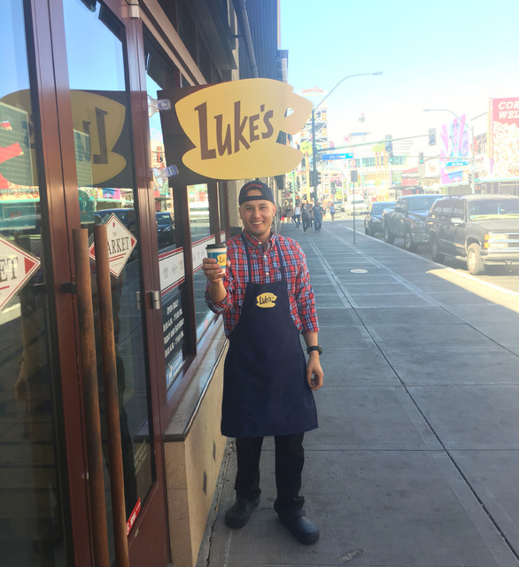Peter Bastien, owner of Bronze Cafe at the Market stands under the Luke's Diner sign. (Janna Karel/Las Vegas-Review Journal)