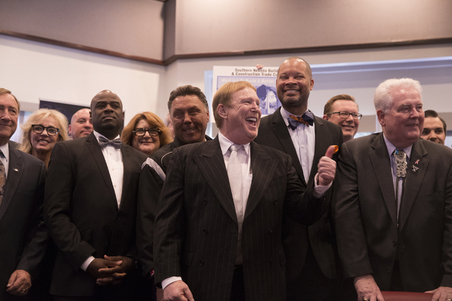Oakland Raiders owner Mark Davis gives a thumbs up to the crowd moments before Nevada Gov. Brian Sandoval signs Senate Bill 1 at the Richard TAM Alumni Center at UNLV on Monday, Oct. 17, 2016, in  ...