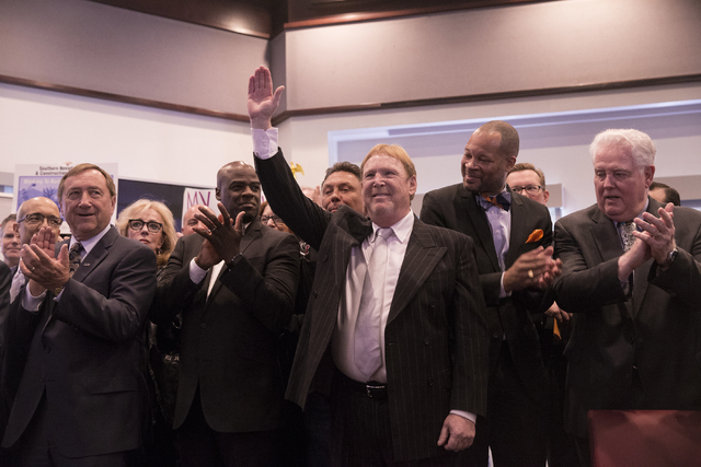 Oakland Raiders owner Mark Davis waves to the crowd moments before Nevada Gov. Brian Sandoval signed Senate Bill 1 at the Richard TAM Alumni Center at UNLV on Monday, Oct. 17, 2016, in Las Vegas.  ...