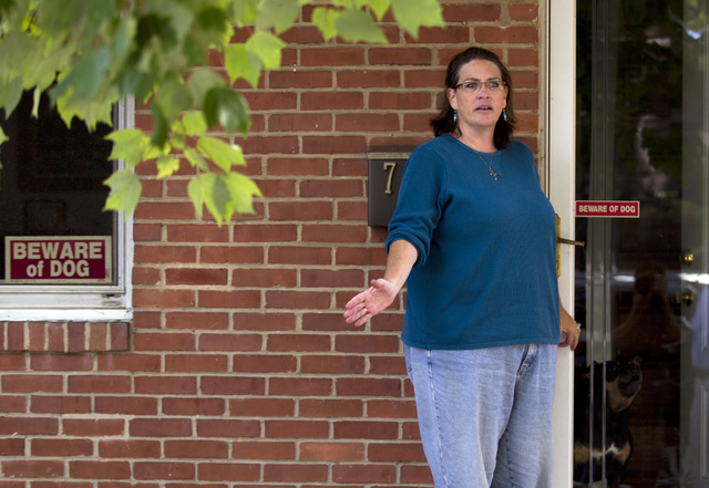Debbie, the wife of Harold Thomas Martin III, talks to reporters outside of her home in Glen Burnie, Md., Wednesday, Oct. 5, 2016. A federal government contractor is accused of stealing highly cla ...