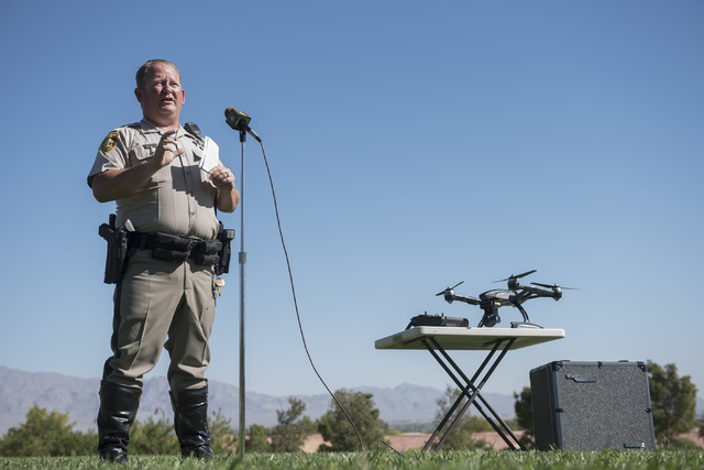 Las Vegas police officer Dave Martel talks about the safe operation of unmanned aircraft systems, commonly known as drones, during a news conference at Police Memorial Park in Las Vegas on Tuesday ...