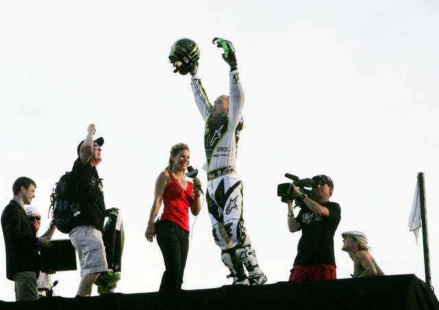 Motocross X game Legend Mike Metzger celebrates after completing a back flip jump over the Caesars Palace fountains on the Las Vegas strip Thursday May 3, 2006. Craig L. Moran/Las Vegas Review-Journal