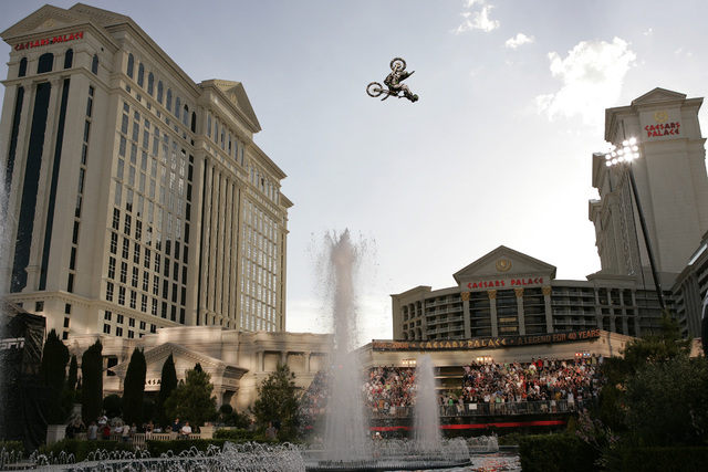 Mike Metzger does a backflip over the fountains at Caesars Palace in Las Vegas Thursday, May 4, 2006. The jump was the longest backflip on a motorcycle. John Locher/Las Vegas Review-Journal