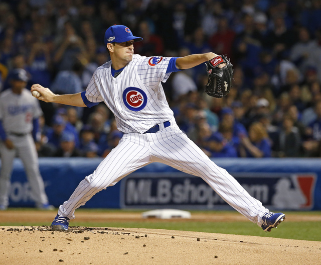 Chicago Cubs starting pitcher Kyle Hendricks (28) throws during the first inning of Game 6 of the National League baseball championship series against the Los Angeles Dodgers, Saturday, Oct. 22, 2 ...
