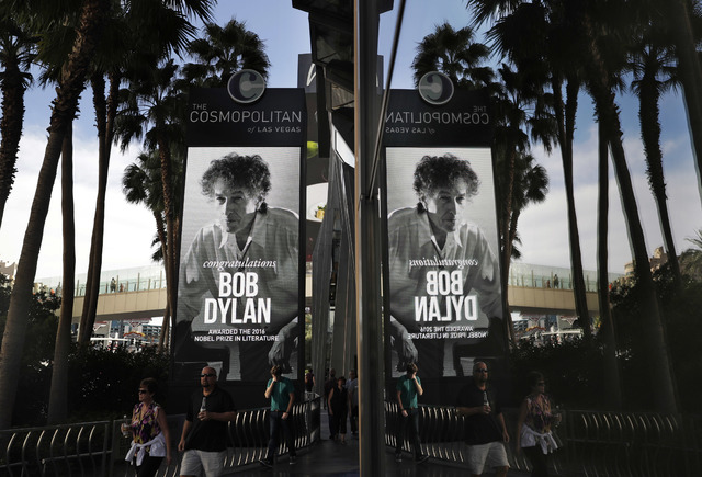 A sign outside of the Cosmopolitan of Las Vegas congratulates Bob Dylan, Thursday, Oct. 13, 2016, in Las Vegas. Dylan won the 2016 Nobel Prize in literature on Thursday. (John Locher/The Associate ...