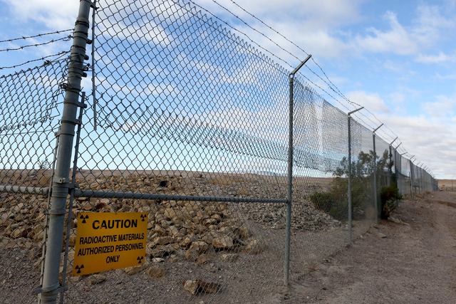 Just beyond the fence is the site of the October 18, 2015 eruption and fire at the closed, state-owned low-level radioactive waste landfill, 11 miles south of Beatty as it looks on October 17, 201 ...