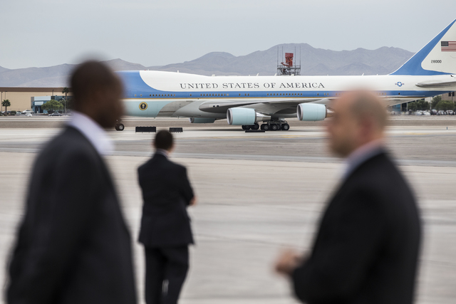 Air Force One taxis after landing on Sunday, Oct. 23, 2016, at McCarran International Airport, in Las Vegas. U.S. President Barack Obama was in Las Vegas campaigning for Democratic presidential no ...