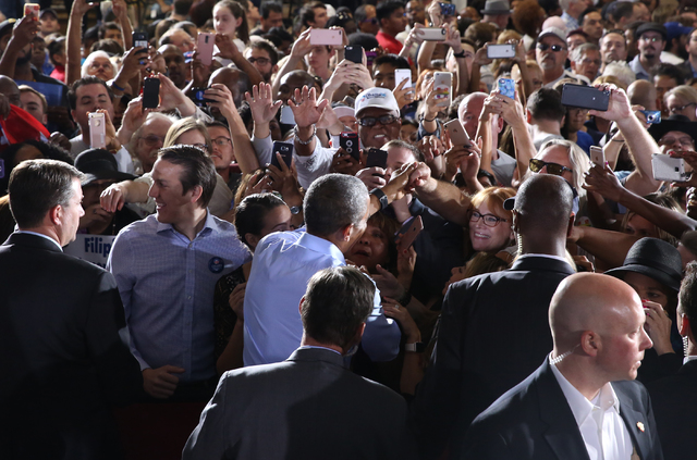 President Barack Obama shakes hands with supporters at a rally organized by the Nevada State Democratic Party at Cheyenne High School on Sunday, Oct. 23, 2016, in North Las Vegas. President Obama  ...