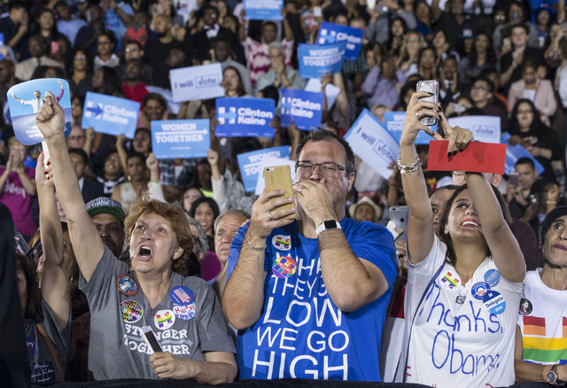 Supporters of President Barack Obama cheer during a rally organized by the Nevada State Democratic Party at Cheyenne High School on Sunday, Oct. 23, 2016, in North Las Vegas. President Obama was c ...