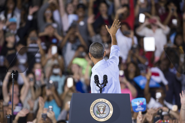 President Barack Obama waves at supporters before his speech during a campaign rally for Democratic presidential nominee Hillary Clinton at Cheyenne High School on Sunday, Oct. 23, 2016, in North  ...