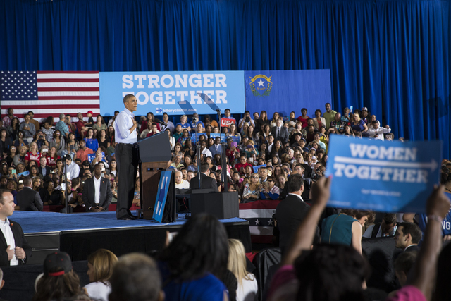President Barack Obama pauses in his speech during a campaign rally for Democratic presidential nominee Hillary Clinton at Cheyenne High School on Sunday, Oct. 23, 2016, in North Las Vegas. Erik V ...