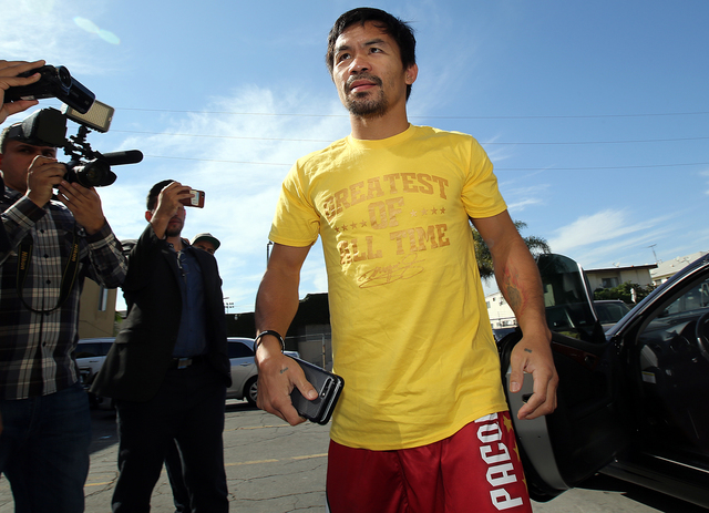 Manny Pacquiao arrives for his Los Angeles media day last week. (Photo by Mikey Williams)
