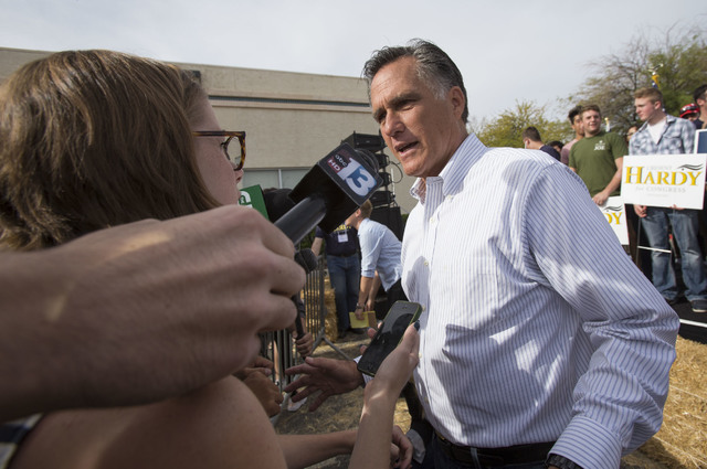 Mitt Romney talks to the news media at a campaign rally outside the Summerlin campaign headquarters of U.S. Rep. Cresent Hardy, R-Nev., in Las Vegas on Oct. 8, 2016. Richard Brian/Las Vegas Review ...