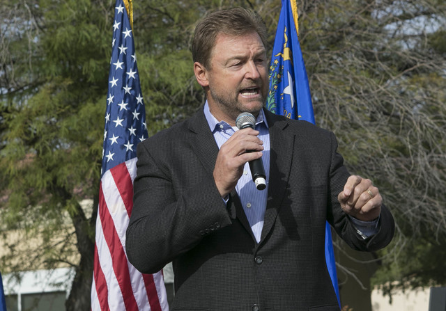 U.S. Sen. Dean Heller, R-Nev., speaks to a crowd at a campaign rally outside the Summerlin campaign headquarters of U.S. Rep. Cresent Hardy, R-Nev., in Las Vegas on Oct. 8, 2016. Richard Brian/Las ...