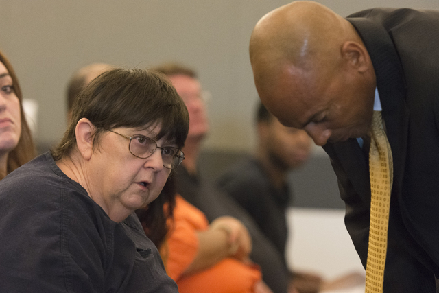 Roxanne Sparks, left, a former bookkeeper accused of transferring more than $200,000 between two of her clients' accounts, speaks with her attorney, Carl Arnold, during sentencing at the Regional  ...