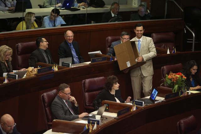 Assemblyman Stephen Silberkraus passes out agendas during day one of the 30th Special Session of the Nevada Legislature, Monday, Oct. 10, 2016 in Carson City, Nev. (David Guzman/Las Vegas Review-J ...