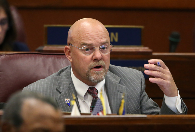 Nevada Assemblyman Ira Hansen, R-Sparks, asks questions about the proposed stadium and convention center projects in Las Vegas during a special session at the Legislative Building in Carson City,  ...