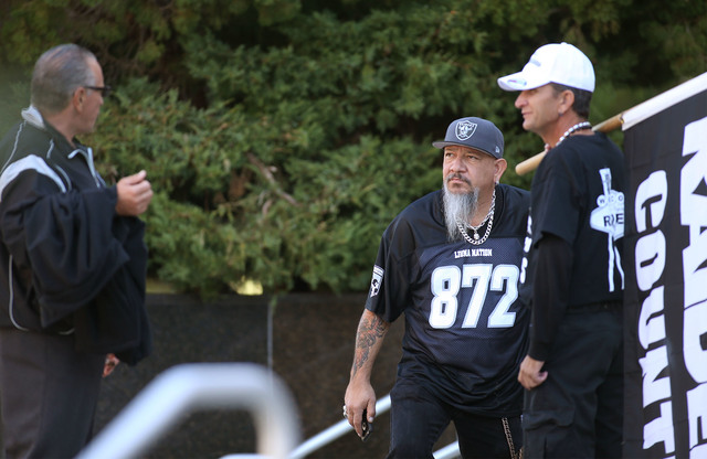 From left, stadium supporters Joe DeLuccia, Henry Baker and Tyrone Schultz talk on the front steps of the Nevada Legislature in Carson City, Nev. on Tuesday, Oct. 11, 2016. Lawmakers are consideri ...